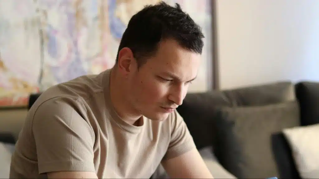 A  man using a phone