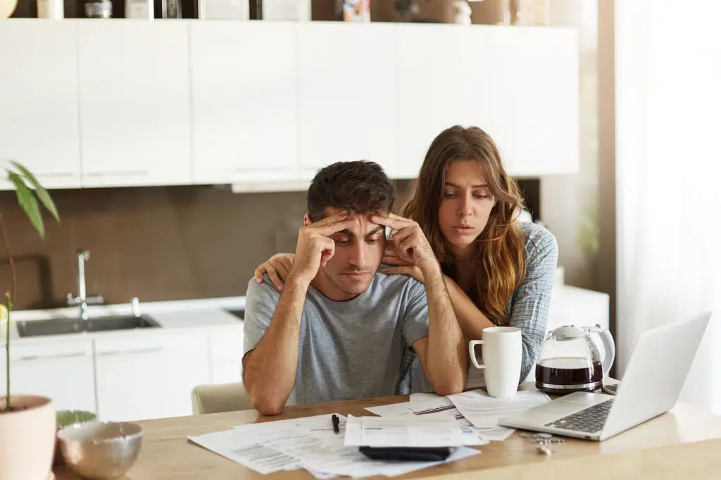 A man and woman having a problem with finances