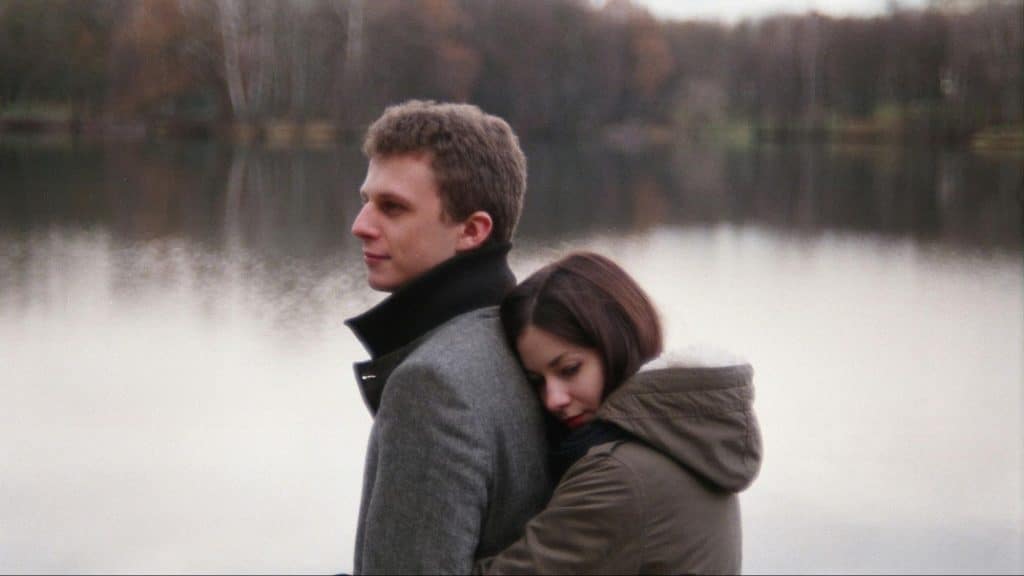 Woman hugging a man
