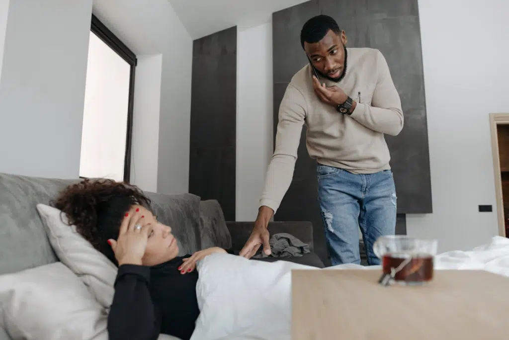 Man Checking On Woman on bed unaffectionate