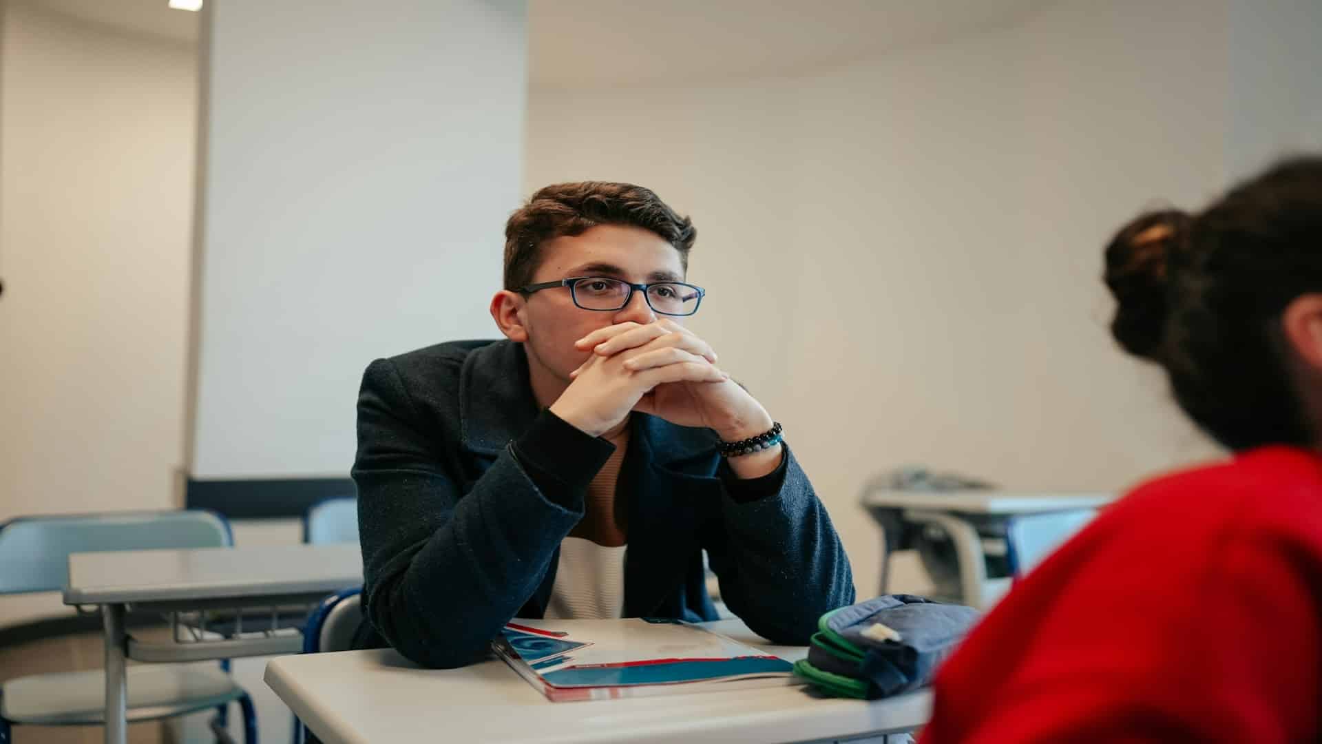 person looking frustrated during discussion