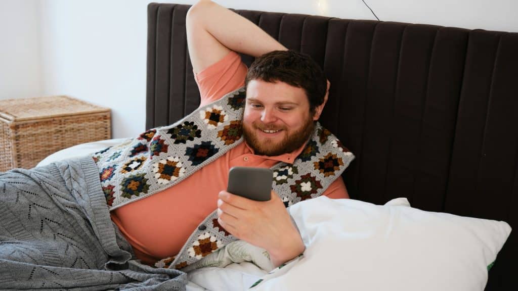 man texting partner