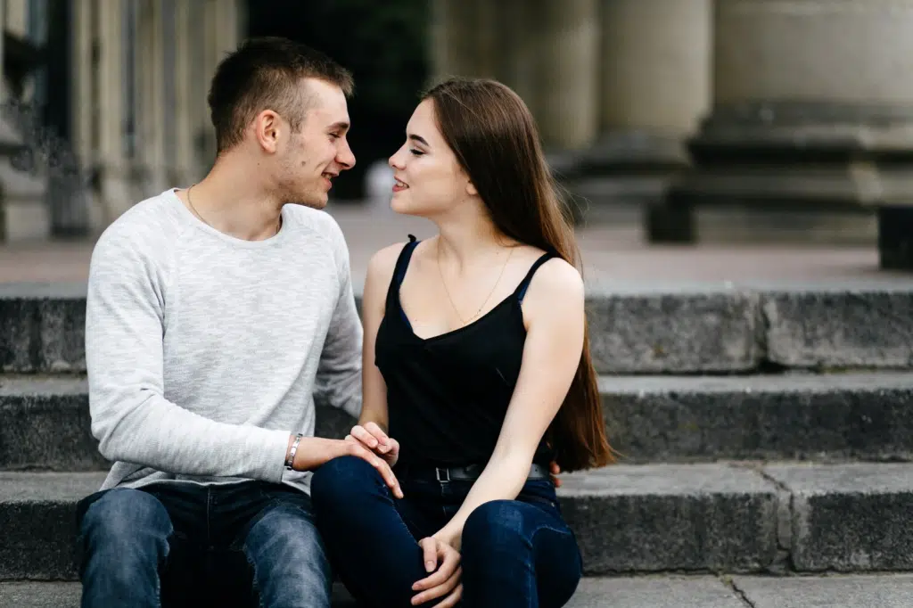 A man and woman flirting with each other
