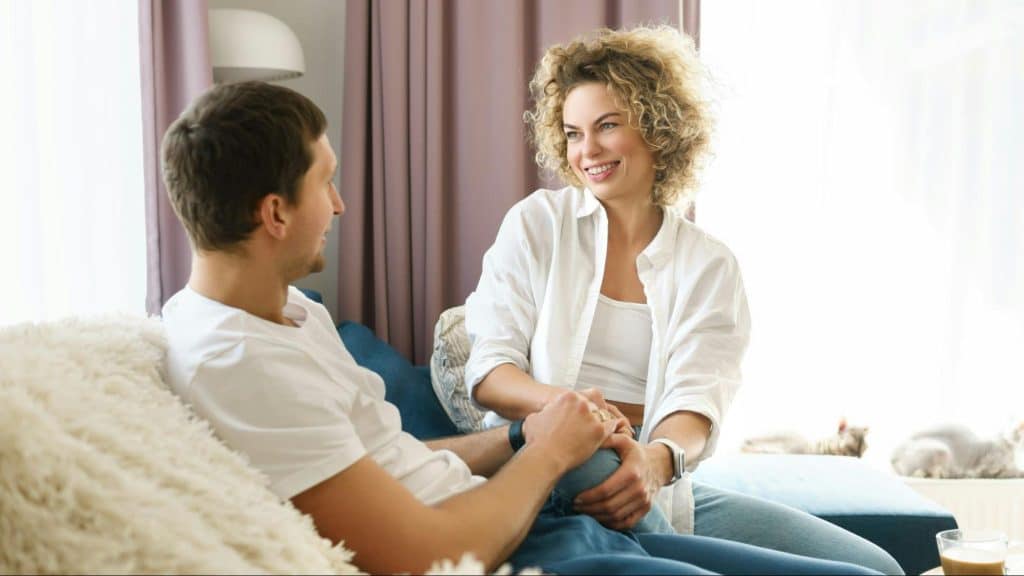 A man and woman holding hands