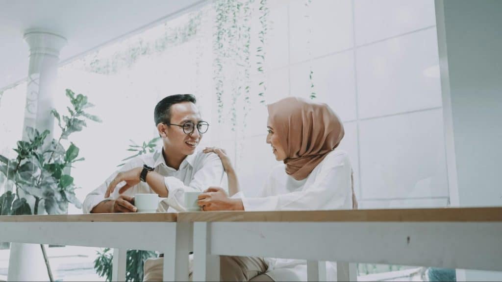 Woman smiling to a man 