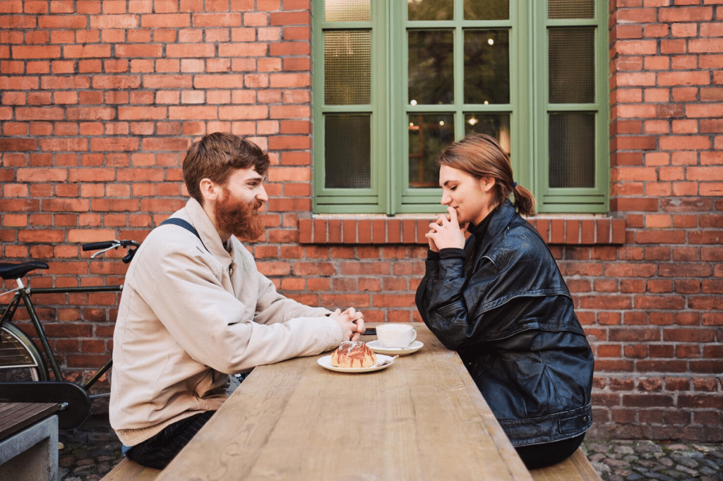 A man talking to woman