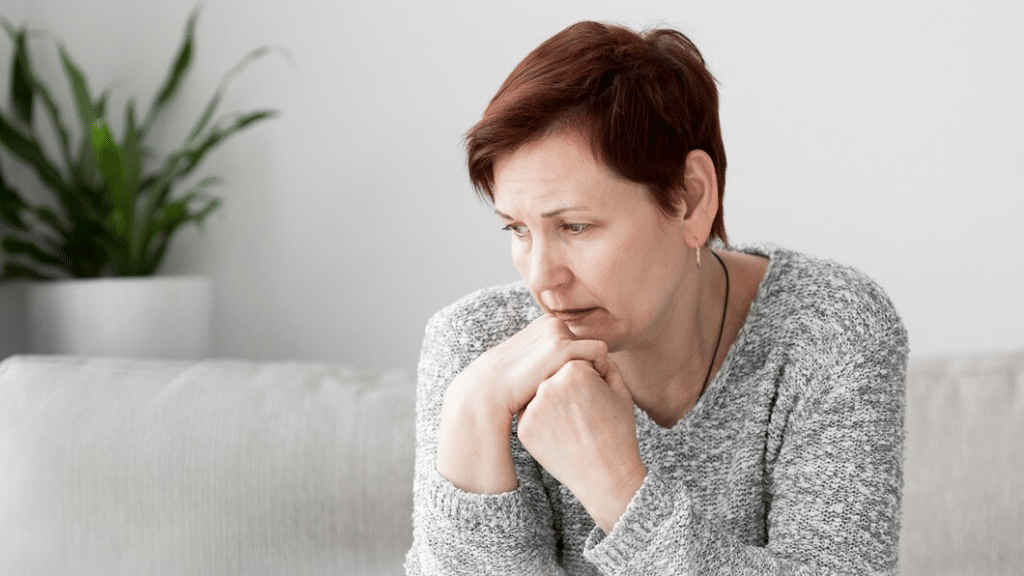 Woman with anxiety on couch