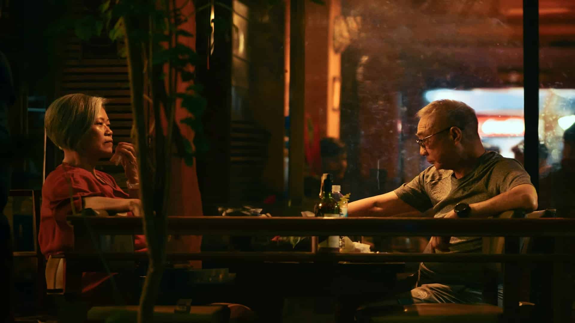 couple arguing at table