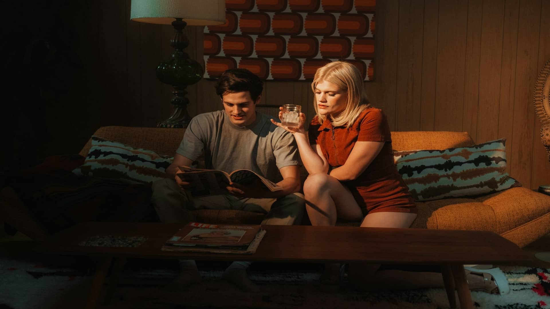 couple having serious conversation on couch