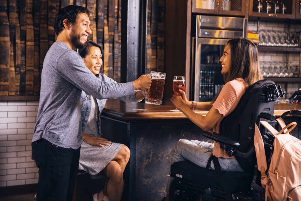 A group of people drinking wine and beer