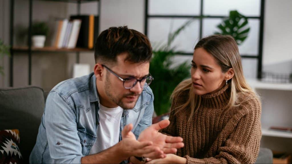 A man and woman talking