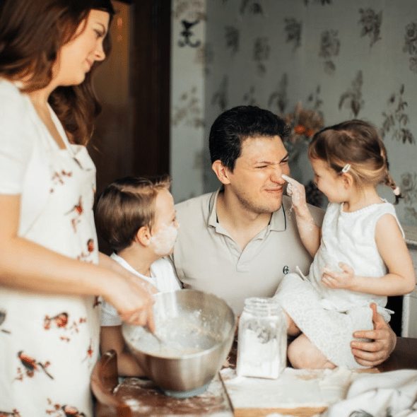 Kids playing with their dad