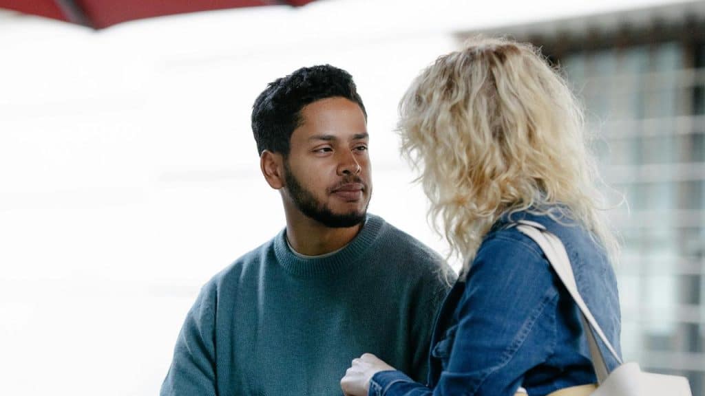 A man and woman talking