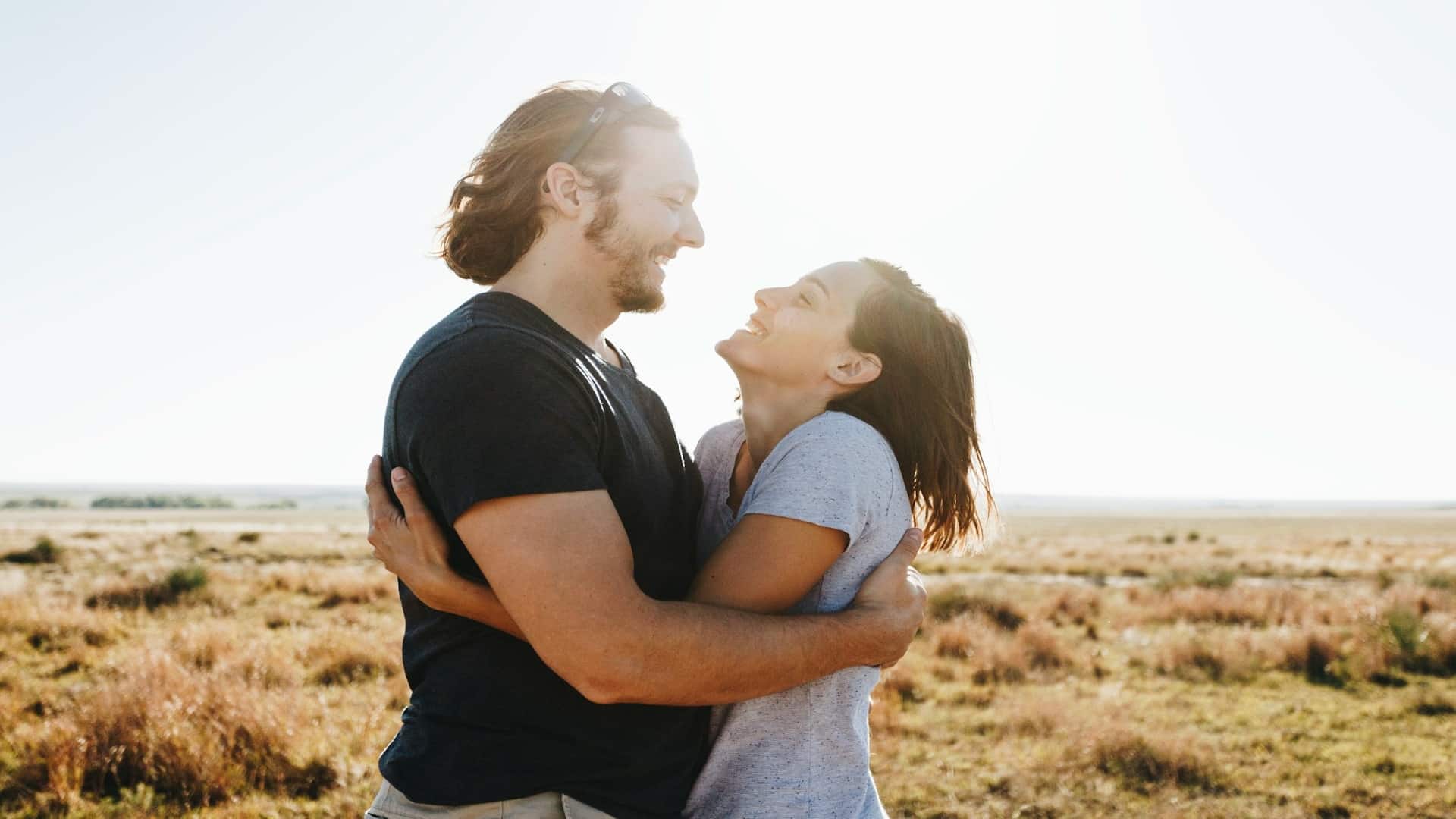 couple smiling warmly together