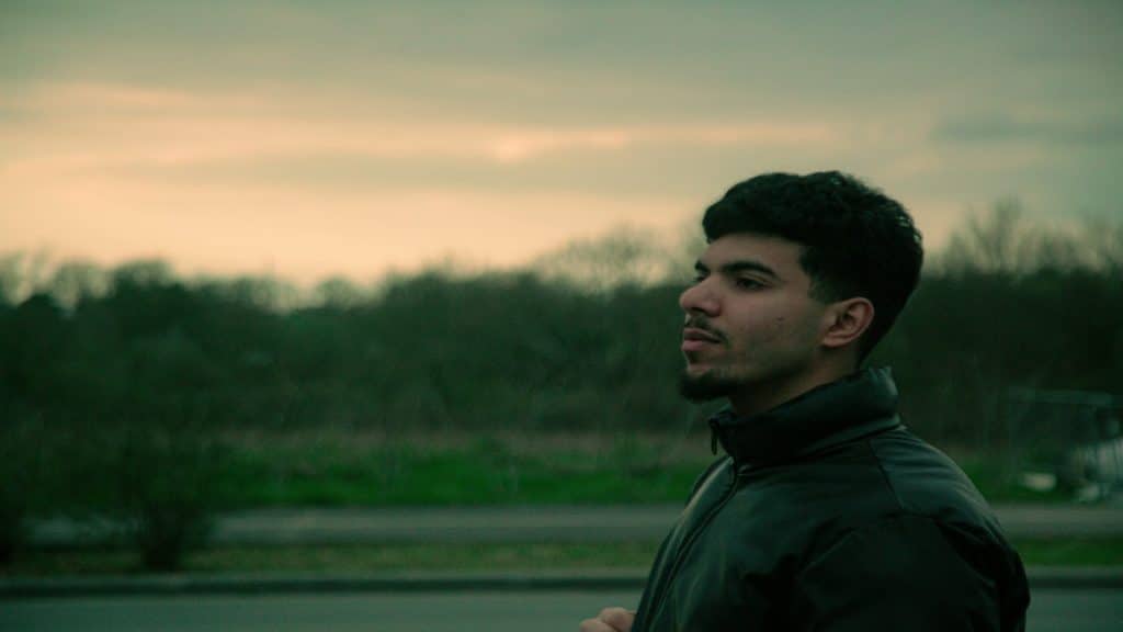 man looking ahead during walk