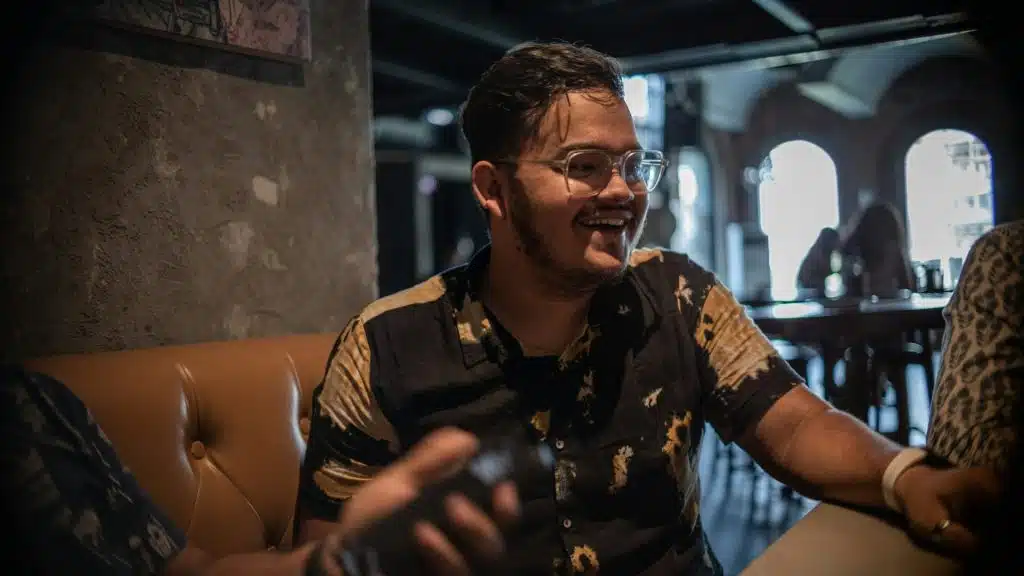 man speaking during conversation