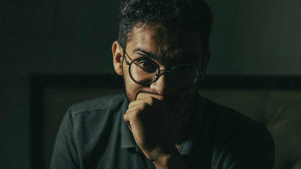 man looking thoughtful but present