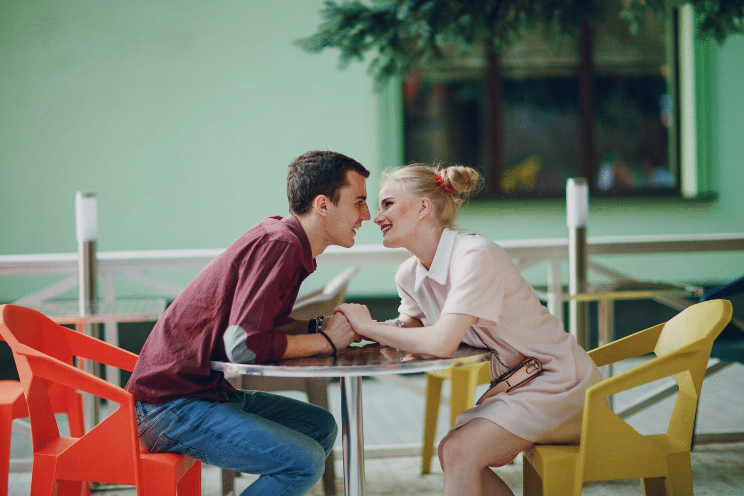A man and a woman are sweet to each other