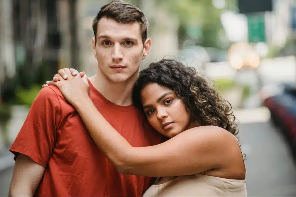 Woman hugging a man