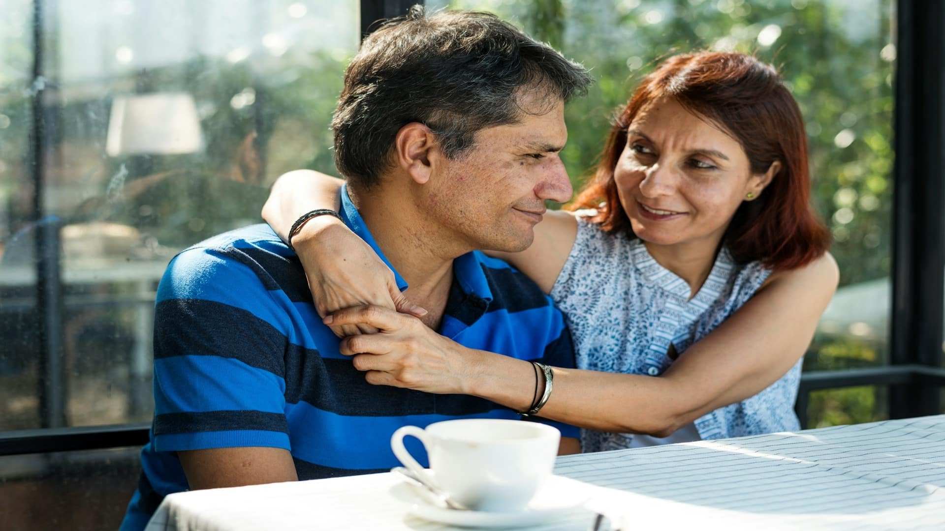 couple discussing something calmly at table