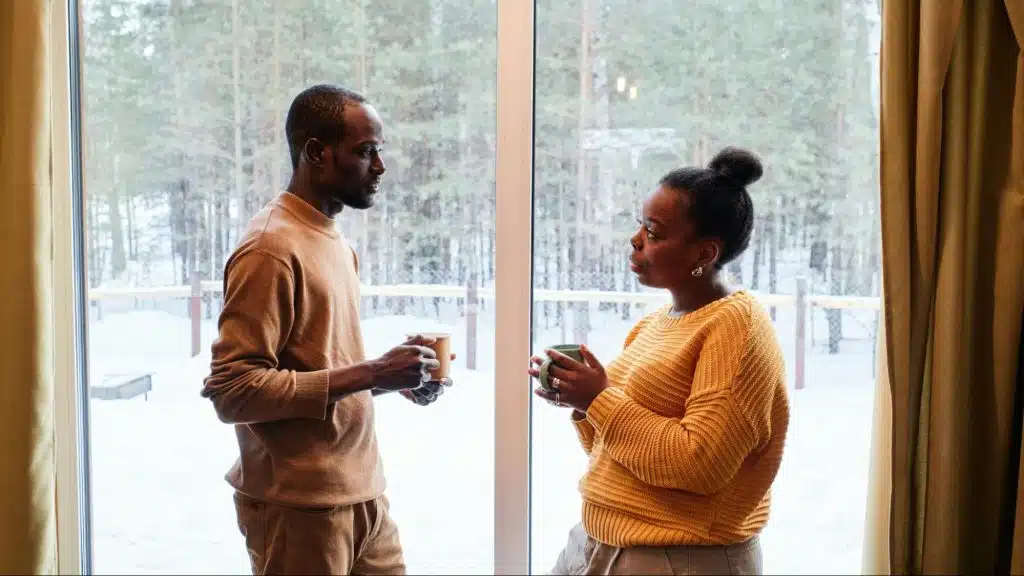 A man and woman looking at each other