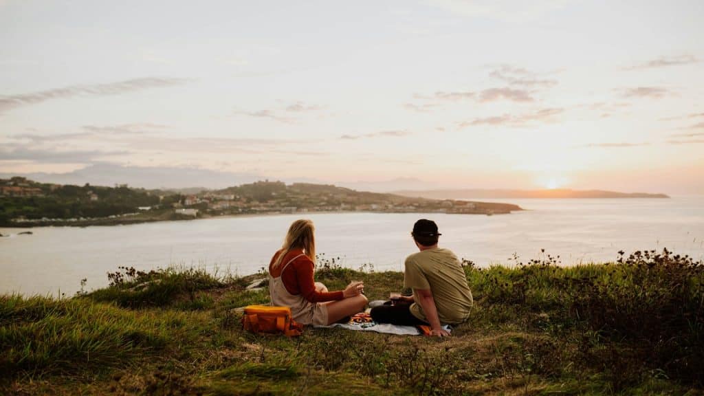 couple watching sunset together