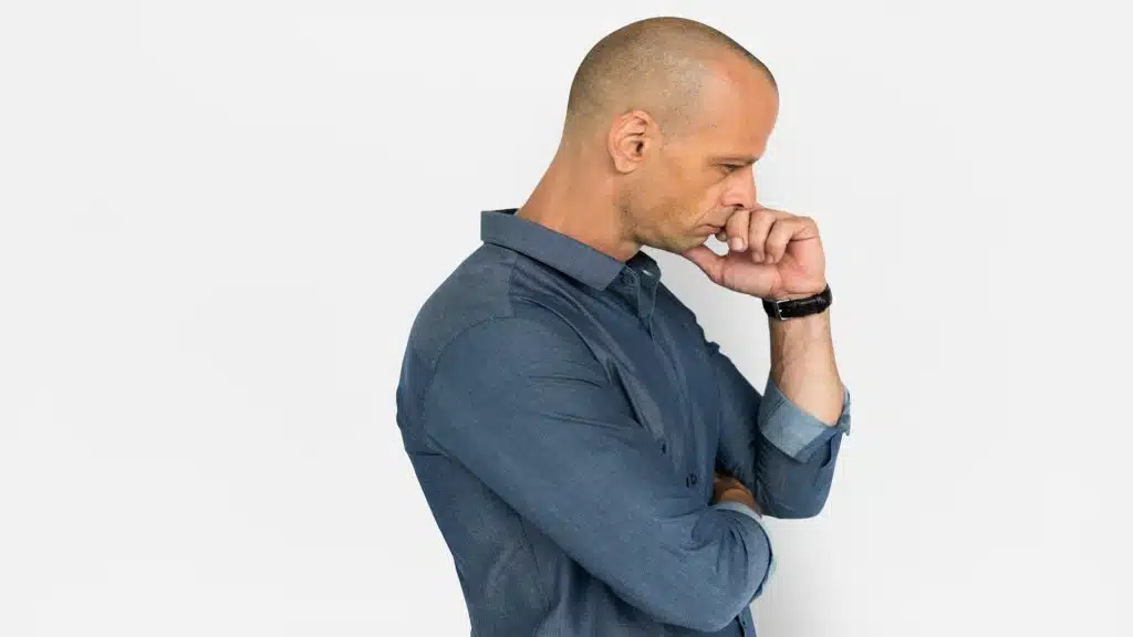 man doing something thoughtful unnoticed