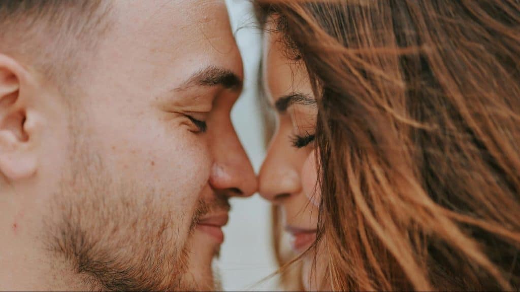 A man and woman close to each other