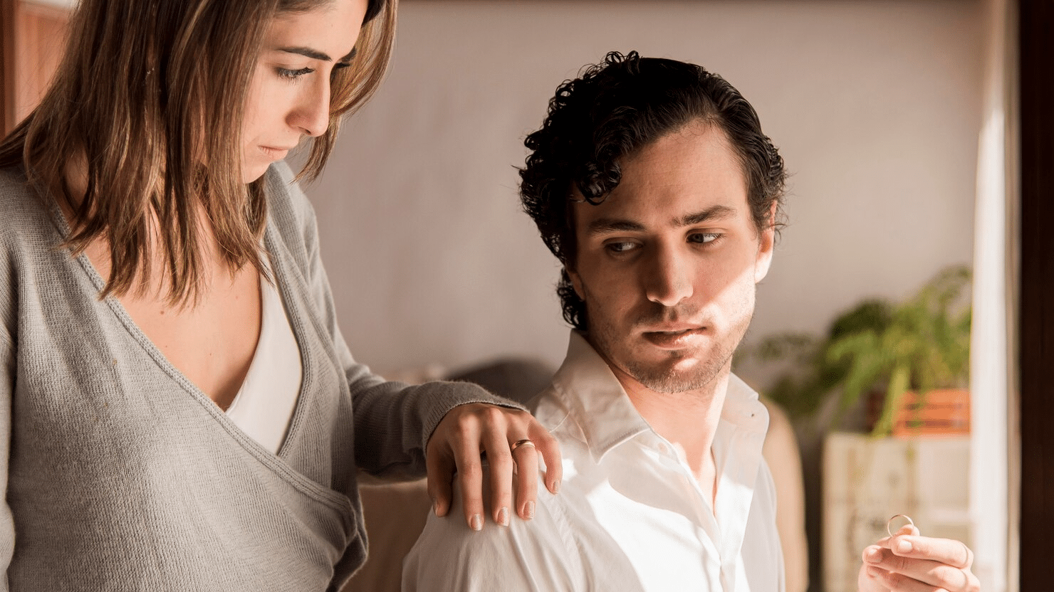 A man being cold towards the woman
