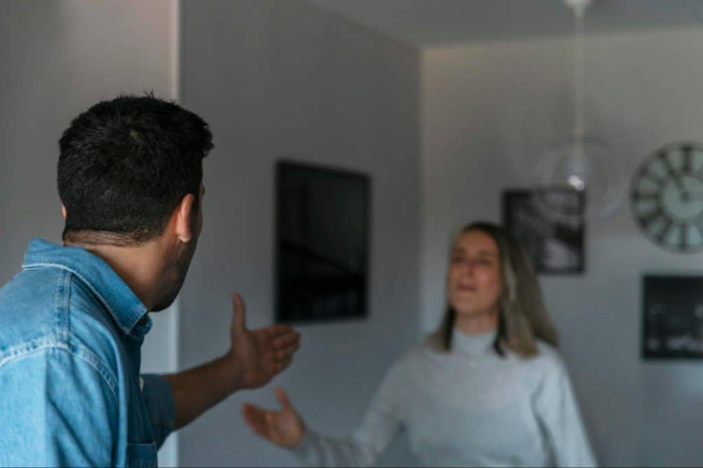 A man and woman arguing