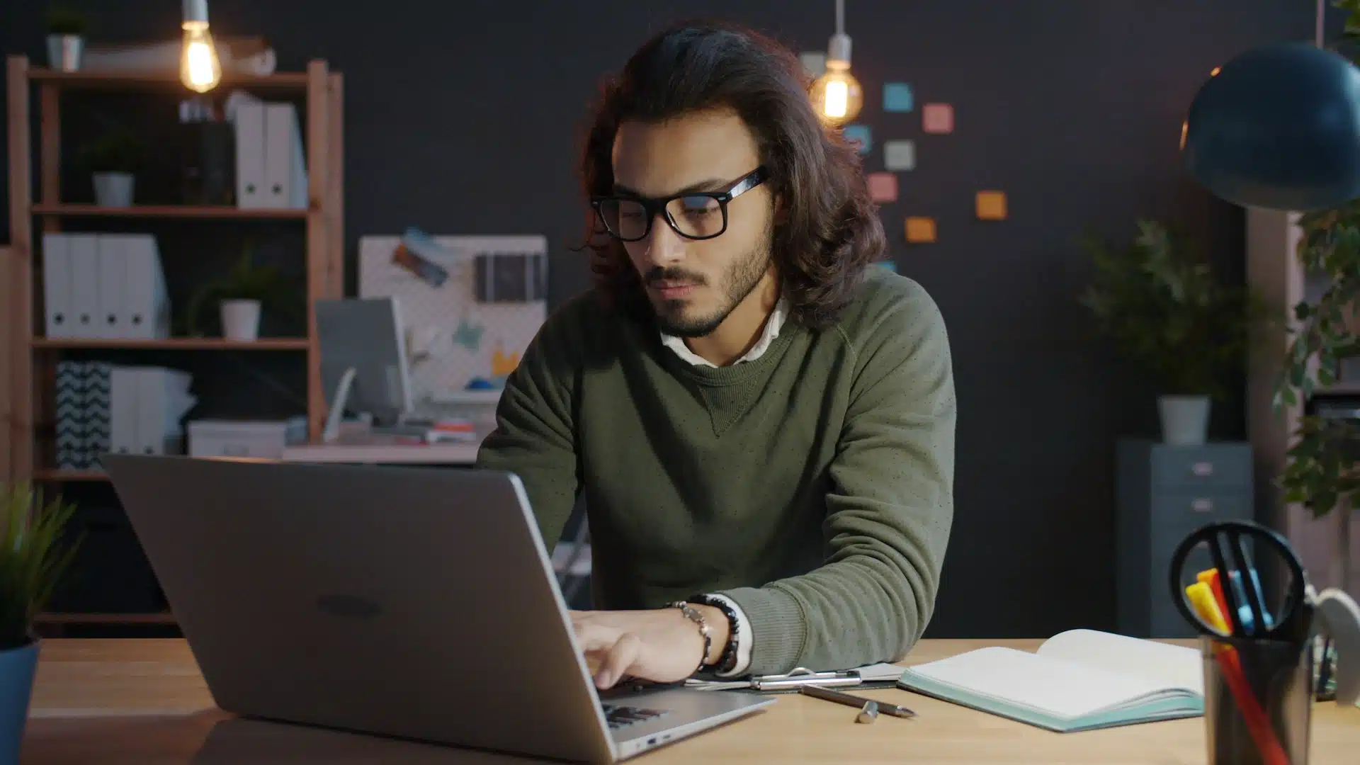 man working late at laptop
