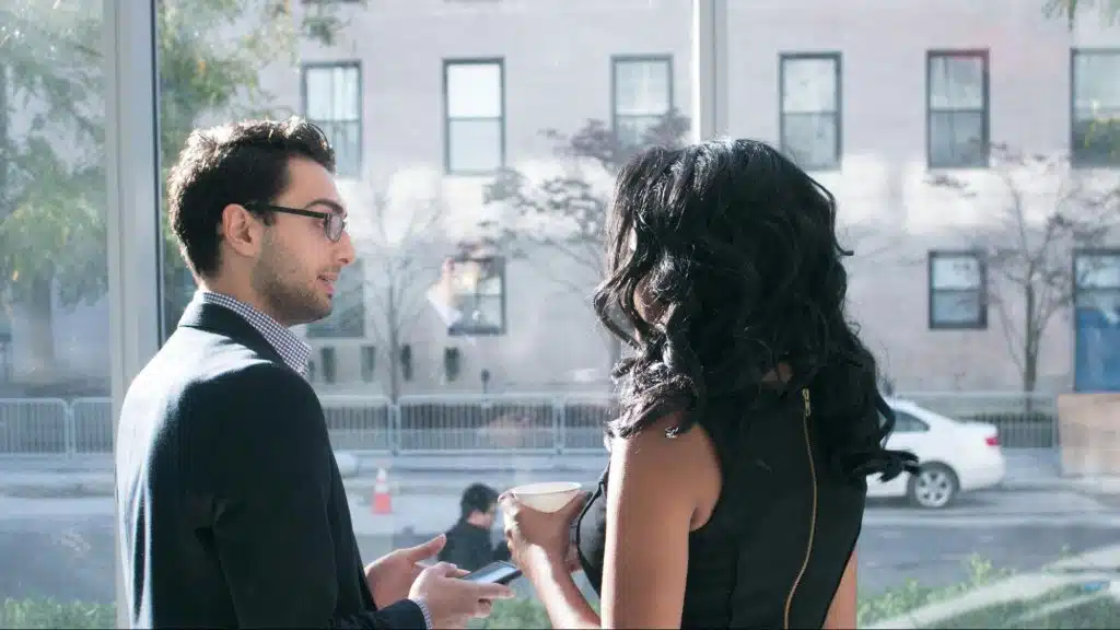 A man and woman talking 