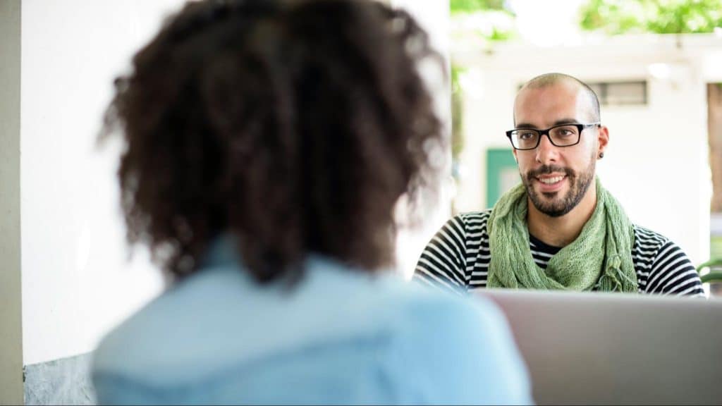 A man observing a woman 