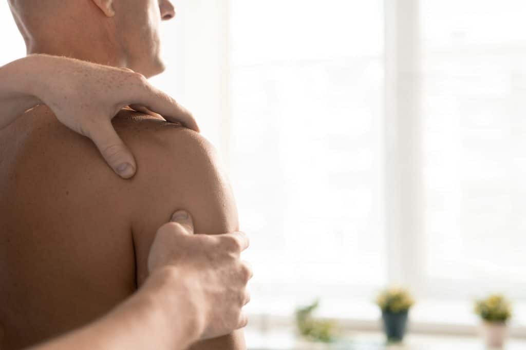 tense shoulders man