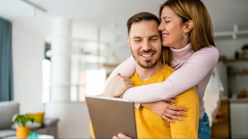 Woman hugging a man