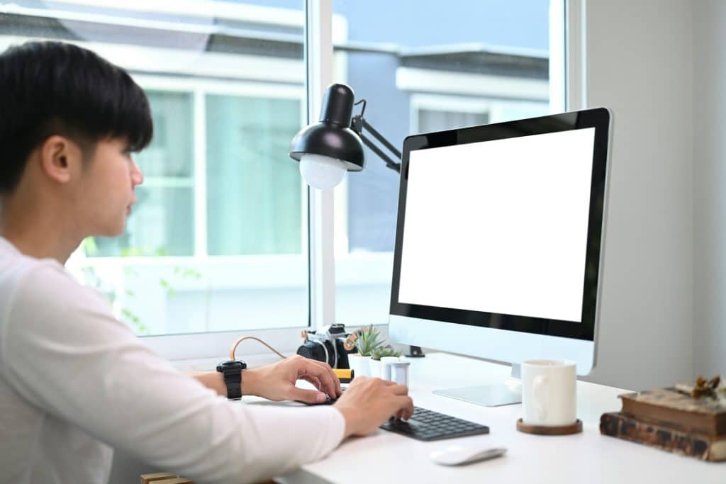 man distracted desk