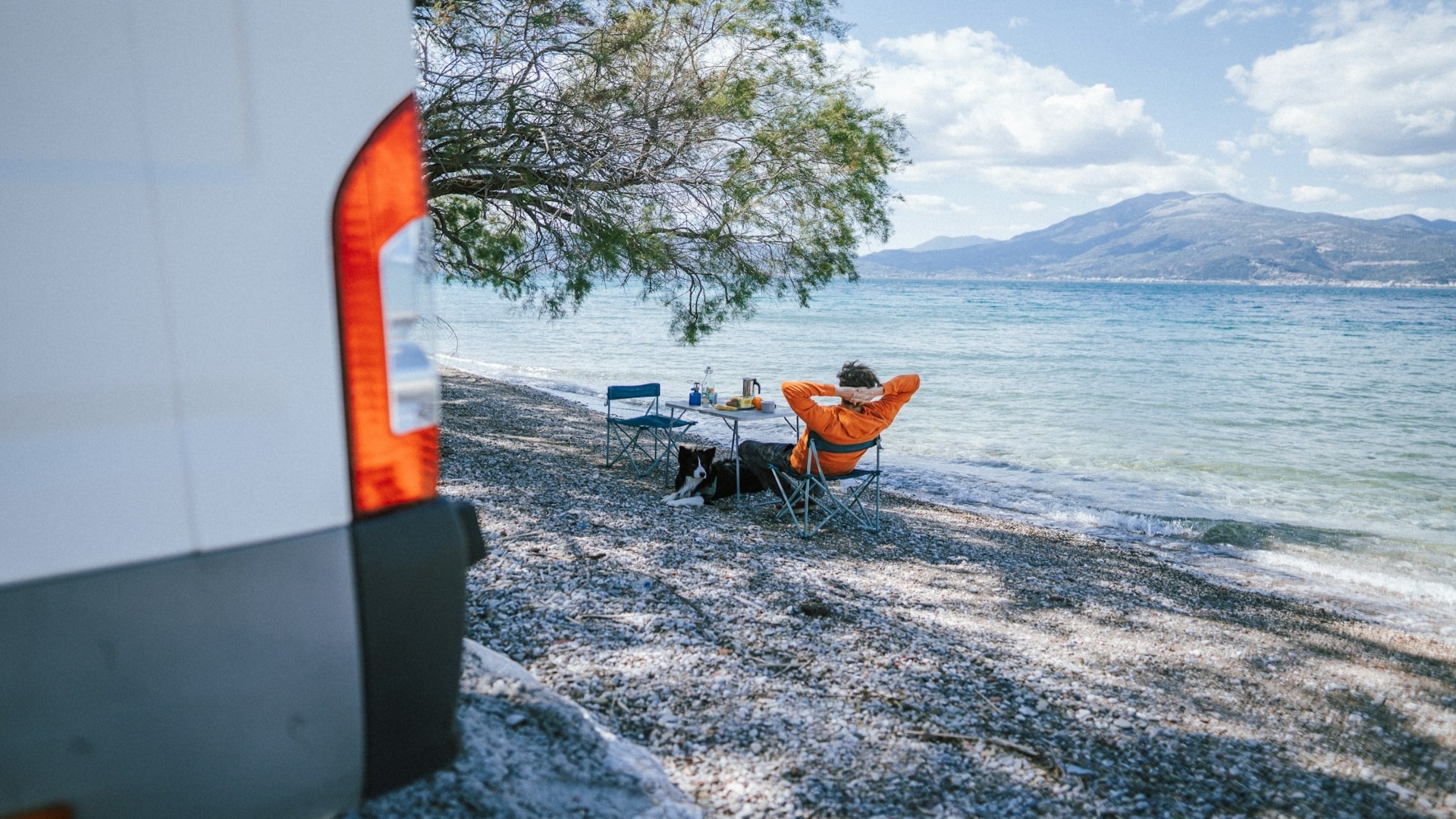 man relaxing alone outdoors