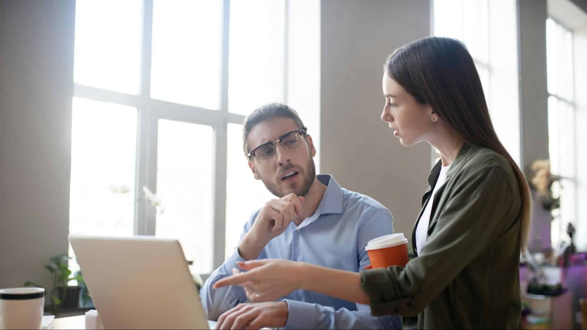 A man talking to woman
