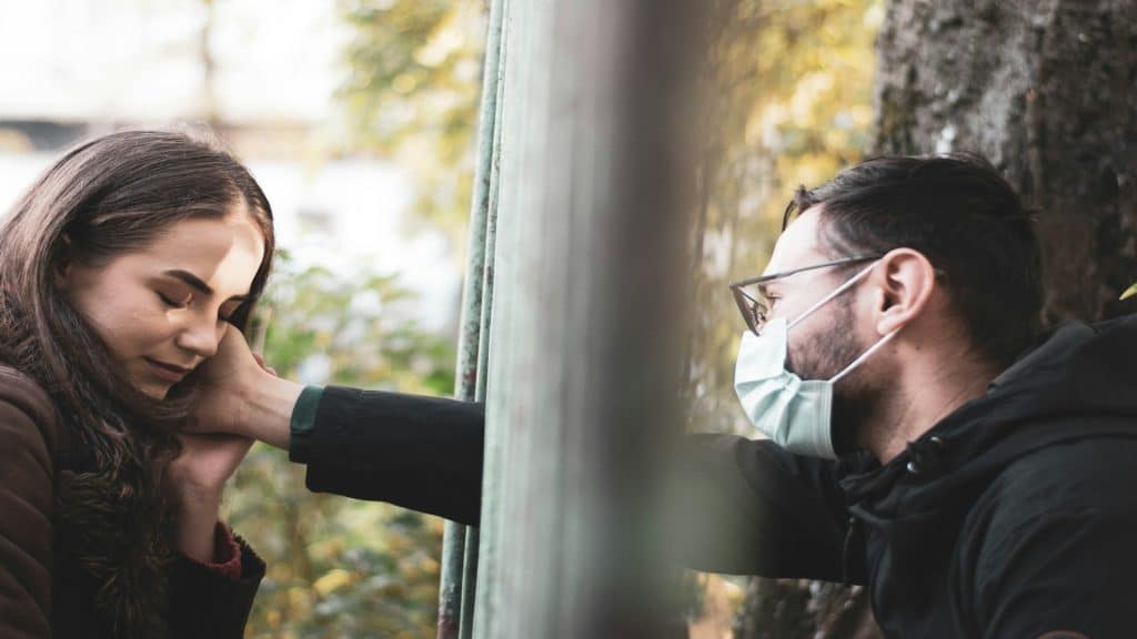 man keeping distance during conversation