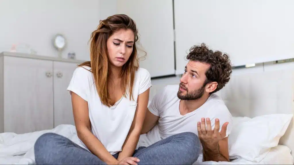 A man and woman talking
