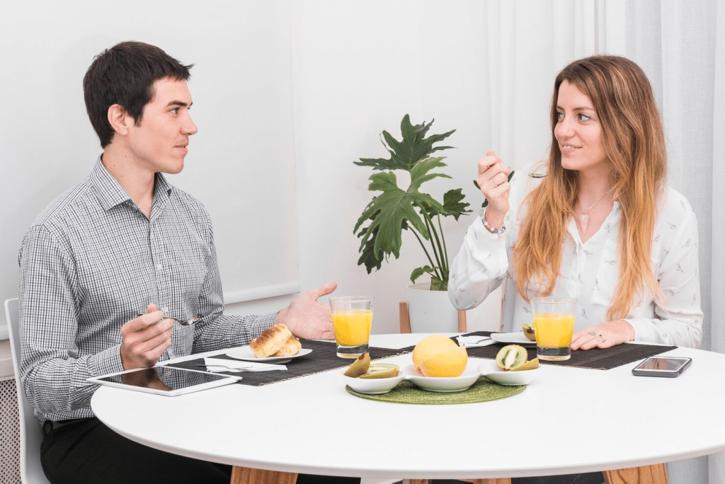 A man and woman talking while dating