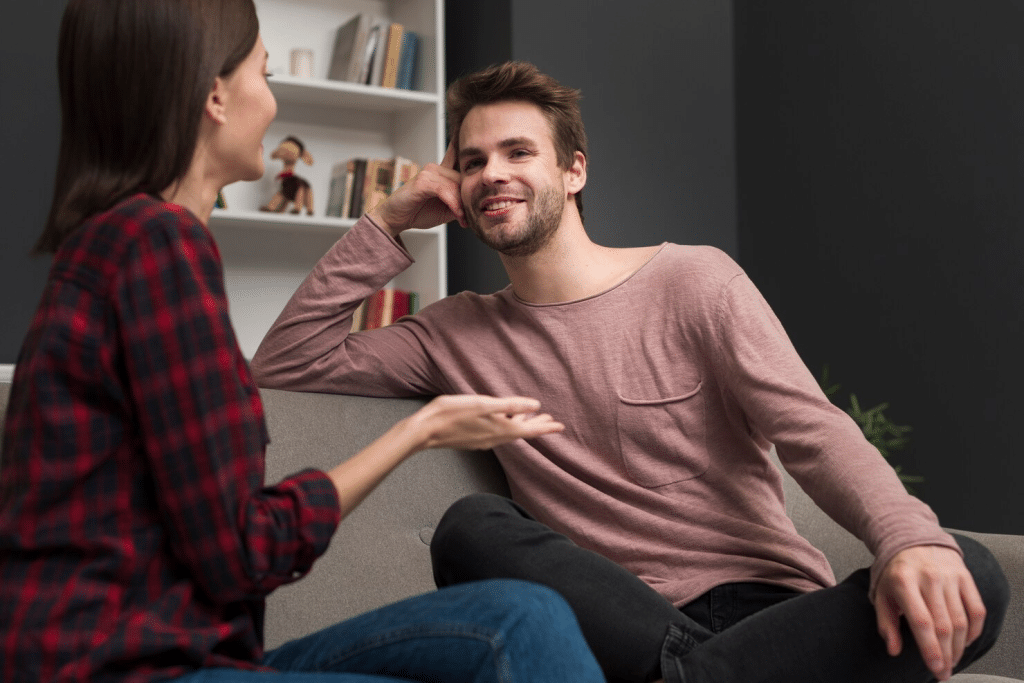 A man listening to woman