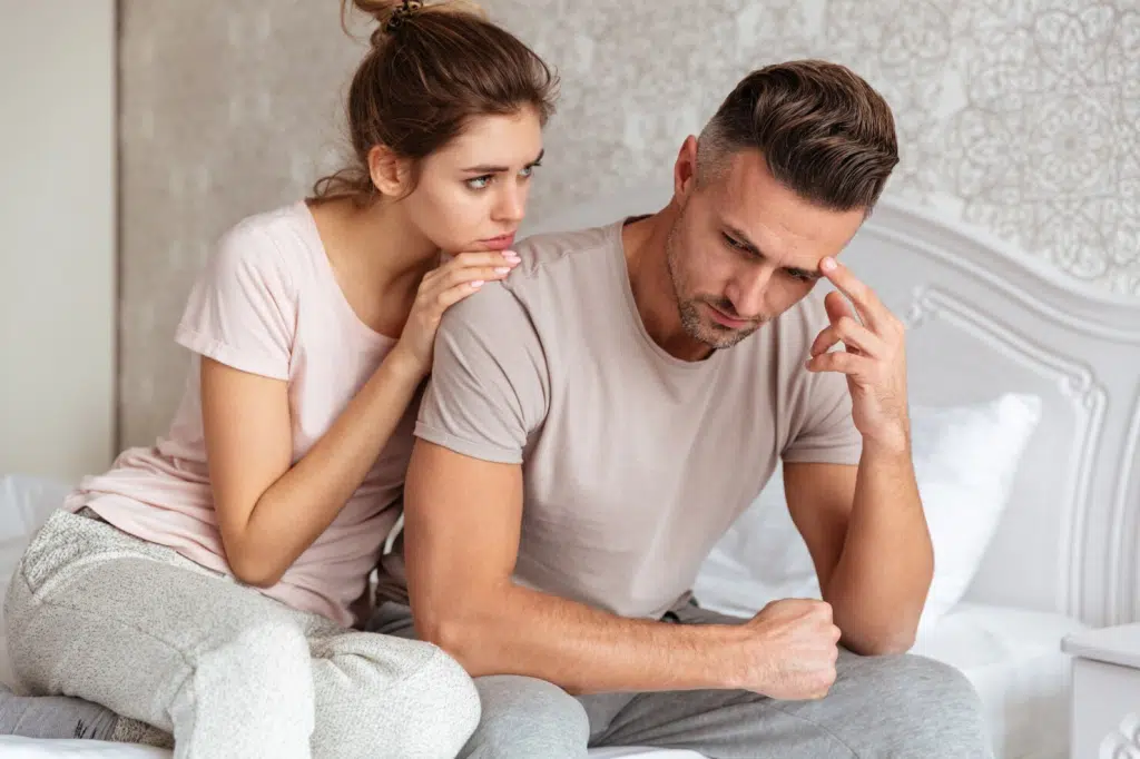 A man thinking about another girl while with woman