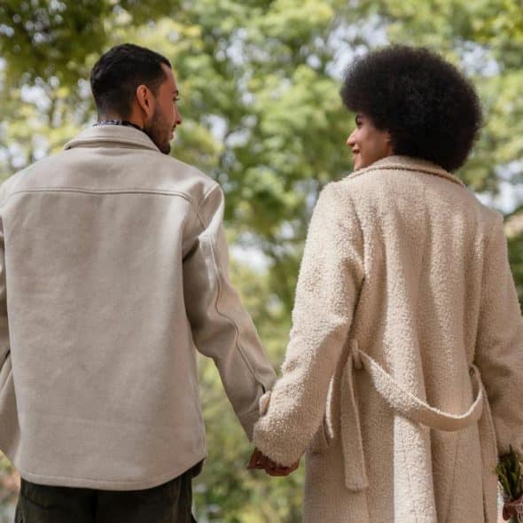 A couple holding hands