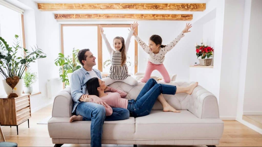 A man and woman with their children