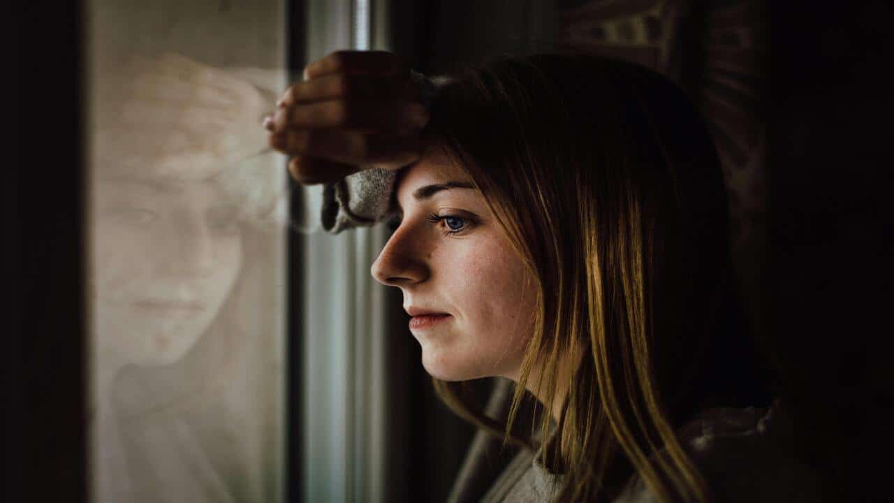 A woman looking out the window