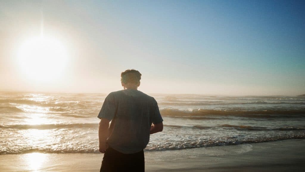 man reflecting outdoors