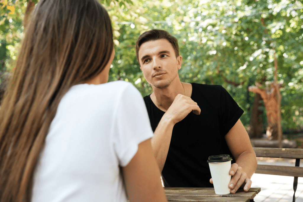 A man and woman talking