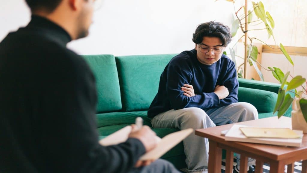 man speaking openly during conversation