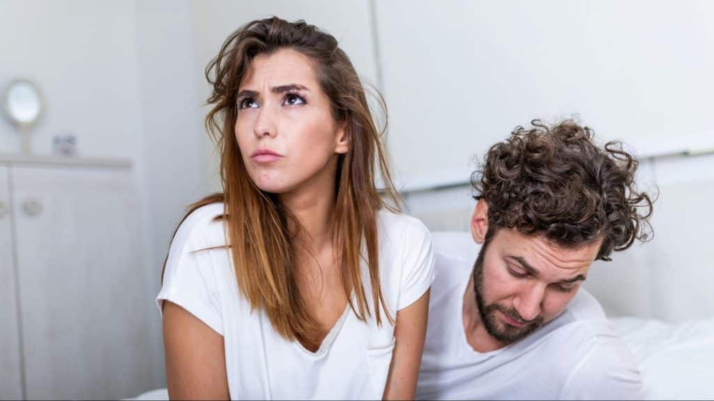 A man and woman not talking to each other